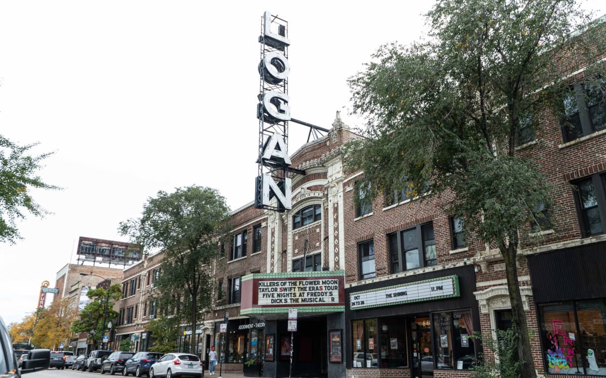 The Logan Theater marquee and surrounding buildings on Milwaukee Ave in Chicago's Logan Square neighborhood