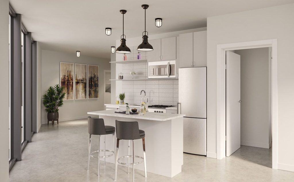 A gorgeous open concept kitchen space at The Rosie apartments in Chicago's Pilsen neighborhood