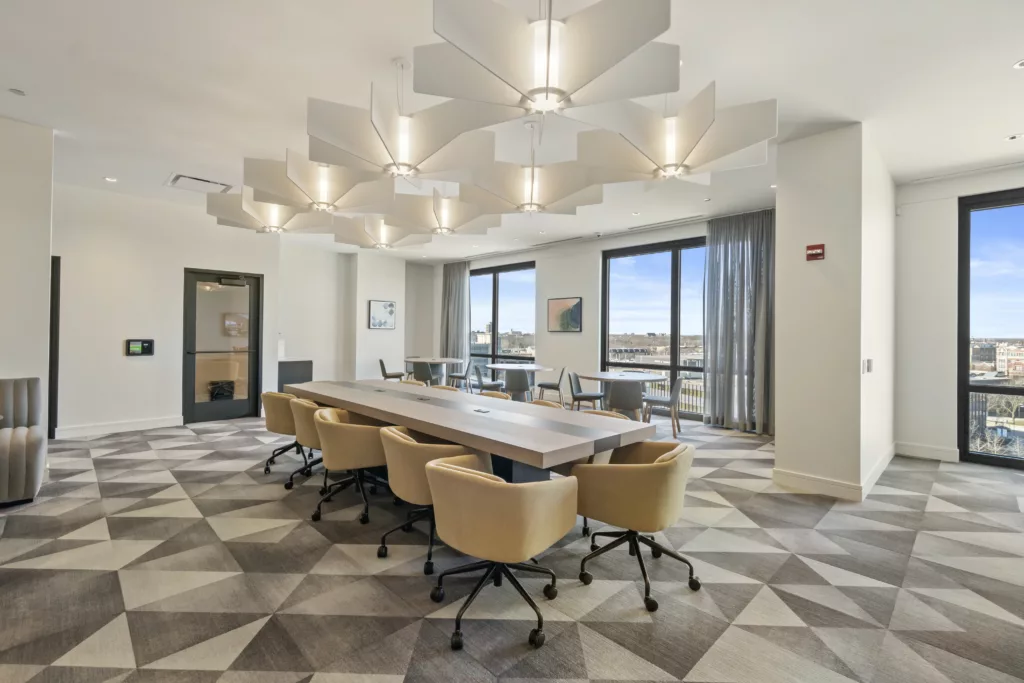 Coworking space inside Platform 4611 with cool lighting and big windows.