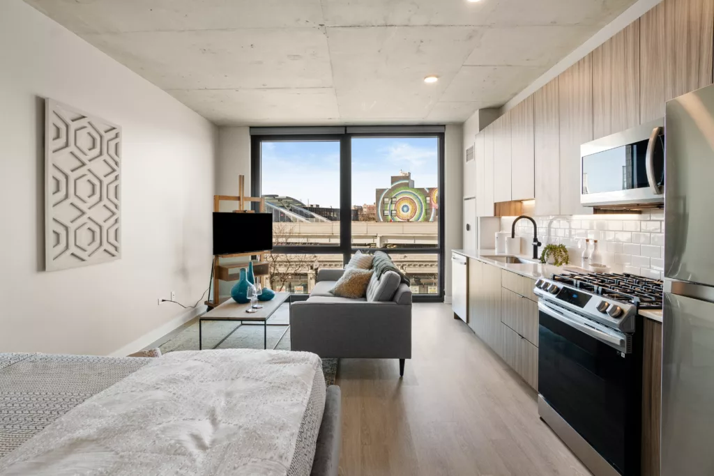 Studio apartment at Platform 4611 with floor to ceiling windows.