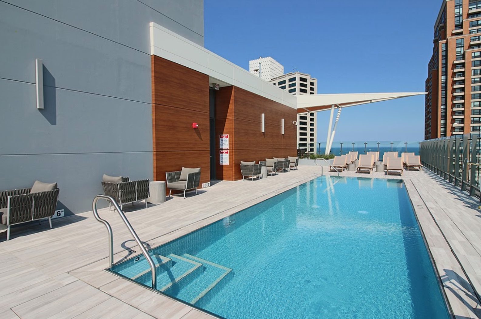 A view of the rooftop pool and Lake Michigan at from downtown Chicago's Eleven 40 luxury apartments