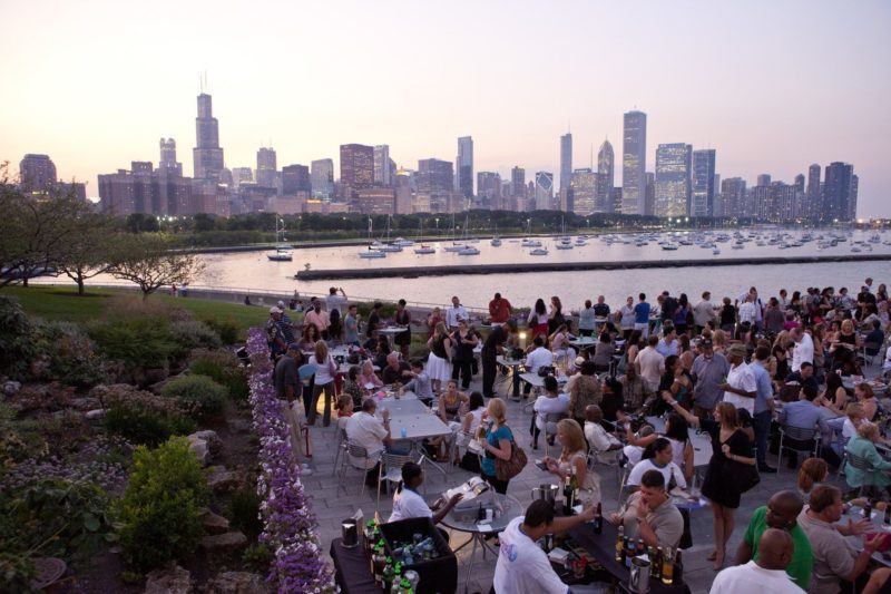 Crowd enjoying City and Lake Views at Jazzin at the Shedd in South Loop at Sunset