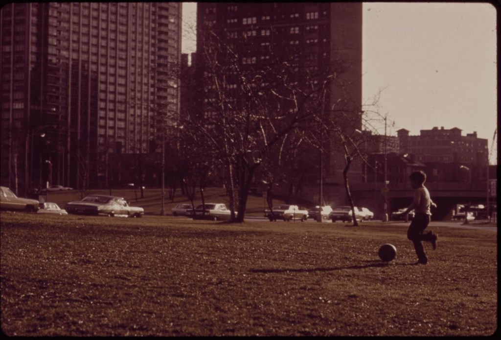 A vintage photo of a child playing in Chicago's Lincoln Park neighborhood in 1973