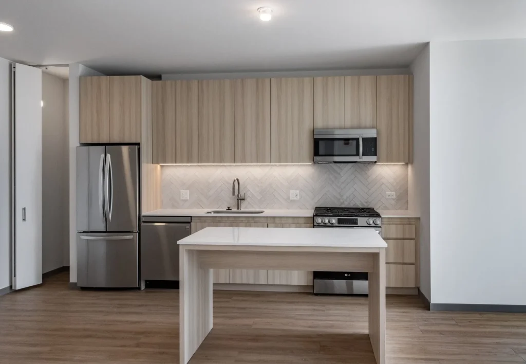 A modern kitchen inside an apartment at The Lydian luxury apartments 