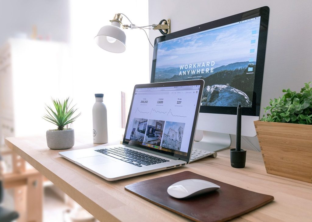 An image of a computer set-up at a work from home office space