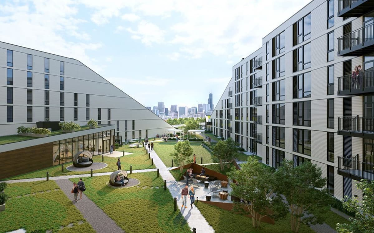 Overhead view of landscaped courtyard at Triangle Square Luxury apartments, with downtown Chicago skyline in the distance